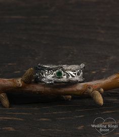 Vintage style tree band with emerald, Unique mens tree wedding band, Men's branch wedding ring, Mens emerald ring, Wide silver ring, Emerald ring ■ All wedding rings are only crafted with the finest of recycled metals DETAILS: Stone - 3mm Natural Emerald, weight approx. 0.10ct. Metal - Sterling Silver Dimensions - width 9mm (0.35 in.), Thickness - 1,7mm (0.066 in.) Finish - shiny and oxidize Please choose your ring size and gems in menu while making your order ■ CUSTOM OPTIONS - SIZES AVAILABLE: Nature-inspired Silver Emerald Ring For Wedding, Nature-inspired Emerald Ring For Wedding, Wedding Ring Drawing, Mens Tree, Branch Wedding Ring, Mens Emerald Rings, Emerald Band, Wide Silver Ring, Emerald Ring Vintage