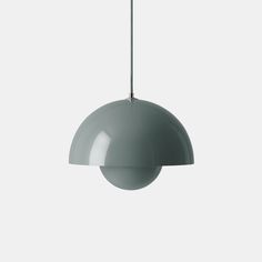 a gray light hanging from the ceiling