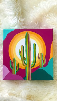 an acrylic painting of a cactus in the desert