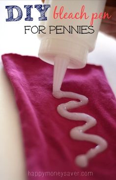 someone is using a dispenser to clean their teeth for pennies on a pink towel