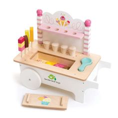 a wooden toy ice cream cart with doughnuts