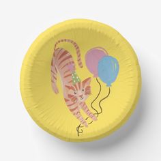 a yellow paper plate with a cat holding a balloon