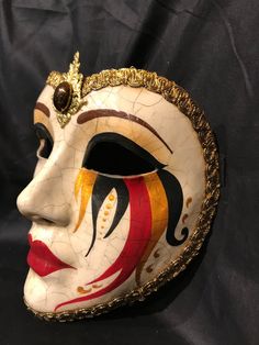 "The shape of this Venetian Mask remembers an heart and it covers the whole face. This traditional Venetian mask shape is called \"Cuore mask\". Size: one size It is a traditional and original papier-mache Venetian mask, handmade and decorated with trimmings, stucco and acrylics. All our masks are handmade papier-machè masks made in Venice. Our decorators use techniques typical of the Venetian tradition such as stucco, acrylics, gold and silver-leaf, macramè, passementerie, pearls and crequelè t Mask That Covers Whole Face, Venice Mask Carnival Masquerades, Paper Mache Clown Mask, Porcelain Mask Aesthetic, Sun And Moon Mask, Masquerade Mask Ideas, Venetian Masks Art, Masquerade Mask Makeup, Cultural Masks