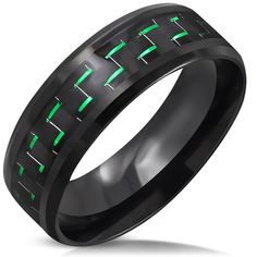 men's black ceramic ring with green arrows inlayed into the center, on an isolated white background