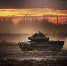 two tanks in the middle of a field