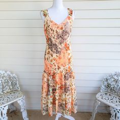 Floral Peach & Tan Ruffled Lined Maxi Dress ~ Size 14 (Runs A Bit Small) ~ Lightweight & Flowing ~ Polyester ~ Pit To Pit 19” ~ Nwot Orange Ruffled Midi Sundress, Orange Summer Midi Dress With Ruffles, Sleeveless Orange Sundress For Garden Parties, Casual Orange Ruffled Maxi Dress, Casual Orange Maxi Dress With Ruffles, Orange Summer Sundress With Ruffles, Orange Sundress For Garden Party, Sleeveless Orange Maxi Dress For Garden Party, Orange Ruffle Hem Beach Dress