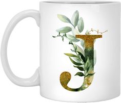 a coffee mug with the letter j painted on it