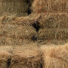 several bales of hay stacked on top of each other