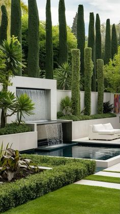 an outdoor garden with water features and trees