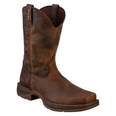 Add some versatile western appeal to your arsenal with the Durango Rebel Western Boots for Men. A great choice for roping, riding, dancing, or relaxing, this sharp-looking boot connects its full grain, antiqued leather upper to its dual-density, rubber/EVA outsoles with double row welt stitching for top toughness. Inside, removable Cushion Flex insoles with contoured and ventilated cushion footbeds provide welcome support and cushioning. Tempered steel shanks provide great stability, while the l Western Boots Outfit, Suede Cowboy Boots, Western Boots For Men, Ducks Unlimited, Roper Boots, Cowboy Outfits, Mens Cowboy, Mens Boots Fashion, Mens Cowboy Boots