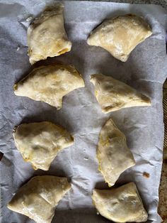 six pieces of food sitting on top of a piece of wax paper