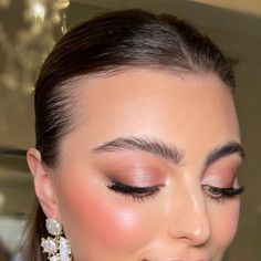 Boe Wright on Instagram: "ROSE GOLD// Tones of warm pinks bring a subtle prettiness to a bronzed completion.  One of my favourite pink tones to include in bridal makeup.  Here hannah is wearing  @tomfordbeauty “golden peach” another alternative is the @charlottetilbury “eyes to mesmerise” in rose gold.   @hannahatkinson_x @botiasaccessories  @charlottetilbury @tomfordbeauty @ardellbeauty @nichebrowco @yslbeauty @diorbeauty @hourglasscosmetics @maccosmeticsuk @kikomilano @spacenk @sephorauk @harrodsbeauty #weddingmakeup #bridal #bridalmakeup #glowmakeup #bronzemakeup #bridetobe" Bridal Make Up Cool Tones, Rosy Bronze Makeup, Rose Gold Makeup Looks Wedding, Bridesmaid Makeup Peach, Bridesmaid Makeup Pink Eyeshadow, Wedding Makeup Blush Pink, Rosy Natural Wedding Makeup, Bronze Pink Makeup, Bridal Makeup Peach Tones