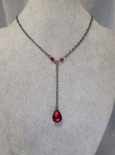 Gunmetal black chain with delicate red bead accents and a brilliant fire lit rhinestone Cheap Red Chain Jewelry, Gothic Red Jewelry With Chain, Red Gothic Jewelry With Chain, Gothic Red Chain Jewelry, Vampire Necklace, Vampire Jewelry, Blood Drop, Octopus Necklace, Prom Necklaces