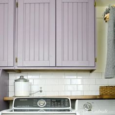 the kitchen is clean and ready to be used as a washer and dryer