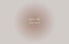 the words enjoy the journey written in white on a gray background with blurry circles