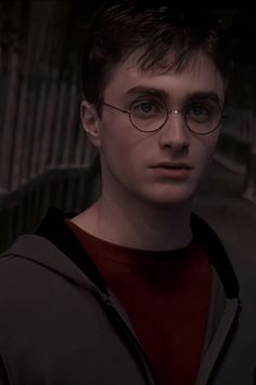 harry potter in glasses looking at the camera