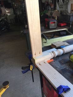 a workbench with tools on it in a garage