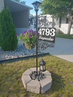 a lamp post with a sign that reads 479 longaclouy