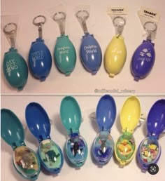 there are many different key chains in the shape of eggs and spoons with pictures on them