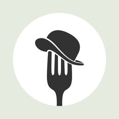 a hat on top of a fork