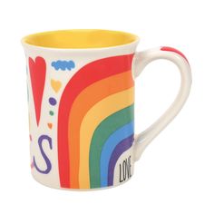 PRICES MAY VARY. ENESCO COFFEE MUG: from the Our Name is Mud collection COLORFUL DESIGN: is covered in peace, love, rainbows and spectacular vibes CRAFTED: from high-quality stoneware material CARE INSTRUCTIONS: coffee mug is microwave and dishwasher safe CAPACITY: holds approximately 16 fluid ounces Halloween Baskets, Santa Wreath, Disney Traditions, Love Rainbow, Witches Brew, Purple Pattern, Stoneware Mugs, Gift Exchange, In Peace