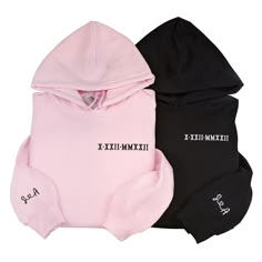 three different colored hoodies with black and pink on them