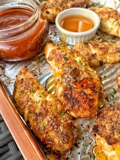 there are some fried food on the tray