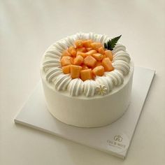 there is a cake that has carrots in it on top of a white plate