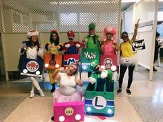 a group of people dressed up in costumes