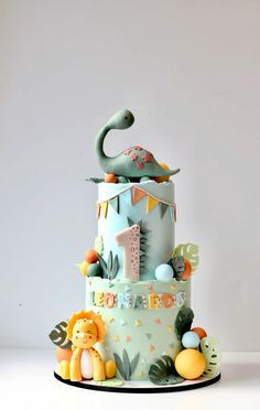 a birthday cake with an elephant on top