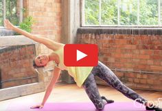 a woman is doing yoga on a pink mat