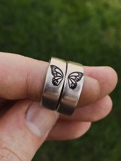 Butterflies represent change, and the courage to embrace a transformation that makes life better. Get this matching butterfly wing ring set for your best friend, sister, or partner. Featuring a gorgeous detailed butterfly wing on each ring. DETAILS: -Two Matching Rings -Each ring is hand stamped -Ring is Aluminum, Sterling Silver, Fine Silver, Rose Gold Filled, or 14k Gold Filled -6mm in thickness**Please note, this ring is OPEN BACK and adjustable** You will receive two hand-stamped rings fille Matching Rings For Siblings, Best Friend Rings Aesthetic, Matching Promise Rings Aesthetic, Matching Friendship Rings, Matching Best Friend Gifts, Adjustable Rose Gold Jewelry With Butterfly Charm, Rose Gold Adjustable Jewelry With Butterfly Charm, Adjustable Butterfly Jewelry Nickel Free, Adjustable Butterfly-shaped Nickel-free Jewelry