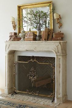 a fireplace in a living room with a mirror above it