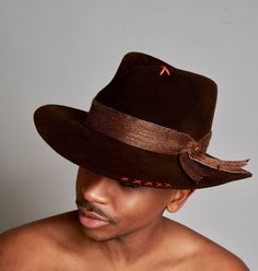 Dark Chocolate Suede Fedora  Hand stitched red satin lining Same material outer band Leather Personalised Sweatband  Model wearing hat size medium - 59cm Handmade in UK Custom Made to Order Dispatched within 3 weeks. for quicker dispatch please contact me Please note - The actual product colour may vary to the image show due to the coluor variations of each photograph and computer screen. RETURNS: Please note that as this product is custom made to your specifications, I cannot therefore allow returns or exchanges so please be sure of your purchase.  Feel free to contact me with any queries before purchasing. On the rare occasion that a customer is dissatisfied I will work with them, making necessary amendments until the item is perfect Fitted Lined Hats For Kentucky Derby, Fitted Brown Top Hat With Flat Brim, Fitted Hat With Short Brim And Lining, Brown Fitted Top Hat With Flat Brim, Fitted Brown Hat For Kentucky Derby, Fitted Hats With Curved Brim And Lining, Fitted Brown Top Hat With Short Brim, Fitted High Crown Felt Hat For Fall, Fitted Lined Hats With Curved Brim