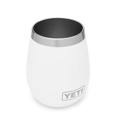 a white yeti cup sitting on top of a table