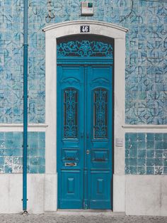 a blue door in front of a building