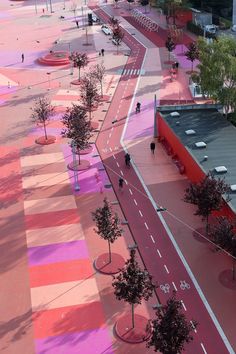 an aerial view of people walking on the street