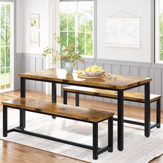 a dining table with benches in front of it