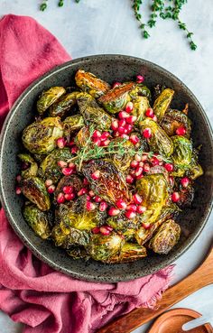 brussel sprouts with pomegranate in a bowl