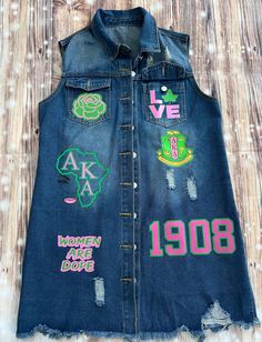 Represent your AKA Sorority with the uniquely styled sleeveless denim vest.   Introducing our iconic jean vest, reimagined for the bold and expressive AKA of today. This classic wardrobe staple gets a contemporary twist with carefully selected designs that allow you to showcase your individuality and passions. Crafted from premium denim, this jacket offers both style and comfort. The high-quality fabric ensures durability, making it your go-to piece for years to come. Sleeveless Denim Vest, Aka Sorority, Classic Wardrobe Staples, Jean Vest, Classic Wardrobe, Vintage Jackets, Premium Denim, Jean Jackets, Vintage Jacket