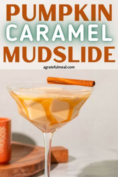 pumpkin caramel mudslide in a martini glass with cinnamon stick garnish