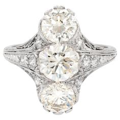 an antique three stone diamond ring