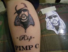 a person with a tattoo on their arm that reads rip pimp c and the image of a man's face