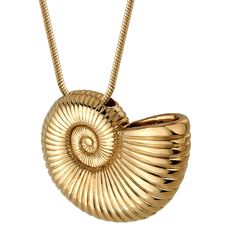 a gold necklace with a large shell on it's back and a chain around the neck