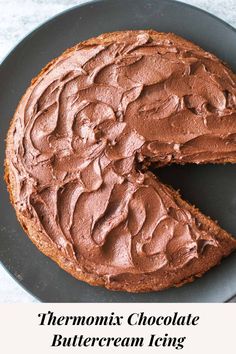 a chocolate cake on a plate with the words, thermomix chocolate buttercream icing