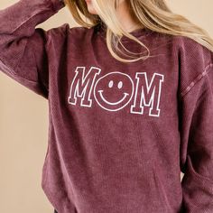 Maroon Corded Sweatshirt - Embroidered - Mom - (Smile) – Little Mama Shirt Shop LLC Relaxed Cotton Tops With Cozy Fit, Comfy Cotton Tops With Cozy Fit, Relaxed Fit Embroidered Tops For Loungewear, Trendy Smiley Face Loungewear Tops, Trendy Smiley Face Tops For Loungewear, Cozy Fit Comfortable Cotton Tops, Comfortable Cotton Tops With Cozy Fit, Comfortable Cozy Fit Cotton Top, Casual Smiley Face Winter Tops