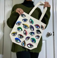 These hand painted optic totes are one of a kind Each bag is hand painted with love and completely original. No bag is exactly alike. Order today to receive a unique tote created with care! Allow me 1-3 weeks to complete and ship! As they are handmade, and only created upon order, I need this time to perfect your bag and have it completely dry before shipment! Care instructions: these totes are painted with a fabric medium but I do not suggest washing them or getting them wet!! spot clean if nec Handpainted Totes, Handpainted Tote, Painted Canvas Bags, Handpainted Tote Bags, Totes Ideas, Painted Purse, Posca Marker, Wet Spot, Handpainted Bags