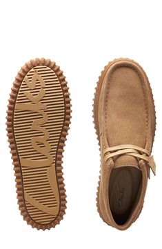 A rib-debossed bumper sole adds rugged detail to a supple suede boot that takes after the iconic Wallabee style with heritage details like skilful topstitching. Removable, cushioned insole with arch support Leather upper and lining/rubber sole Imported Clarks Wallabees Men Outfit, Clarks Wallabees Men, Clarks Originals Men, Clarks Wallabee, Chukka Sneakers, Clarks Wallabees, Suede Chukkas, Chukka Boots Men, Chukka Boot