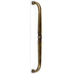 an antique brass door handle on a white background