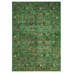 a green rug with an ornate design on the front and back side, in various colors